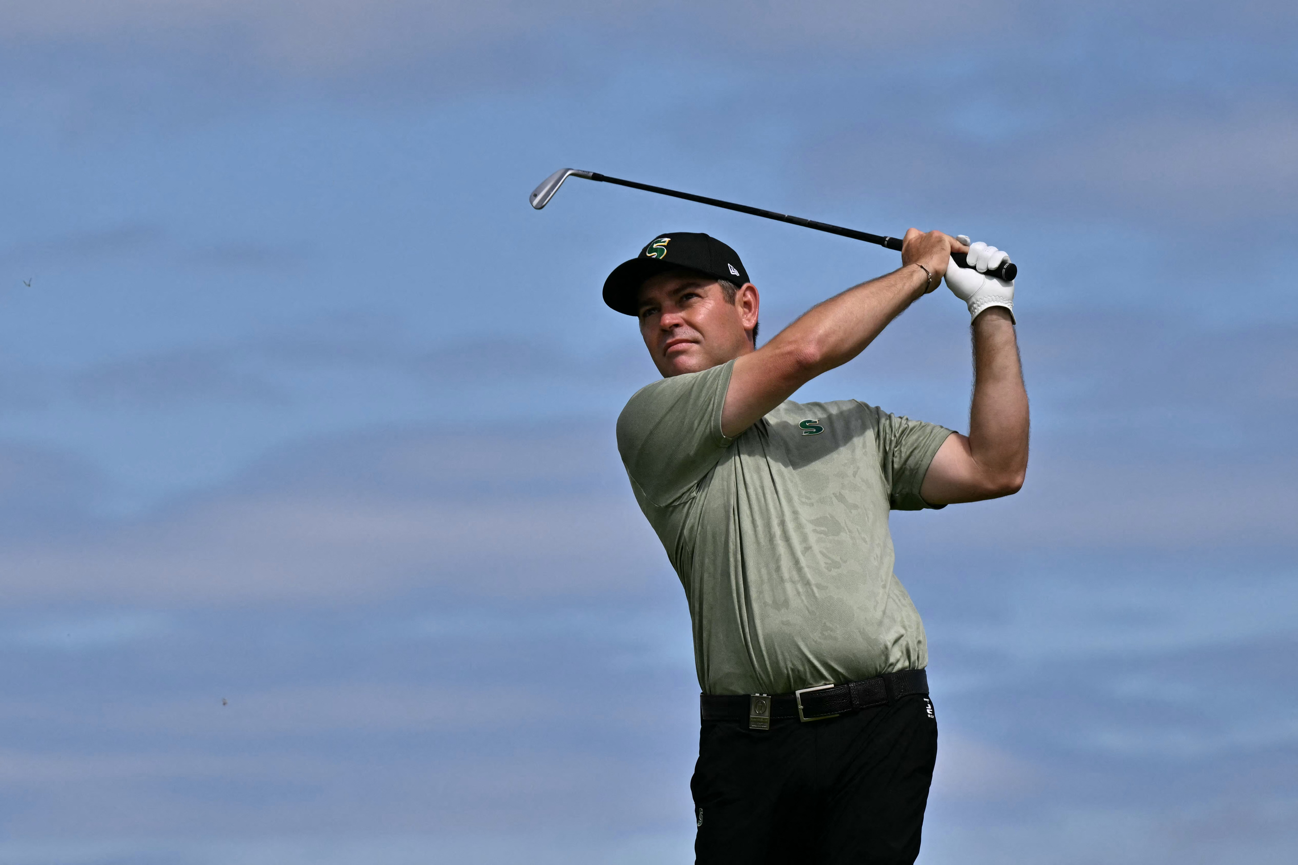Louis Oosthuizen hits an iron off the tee