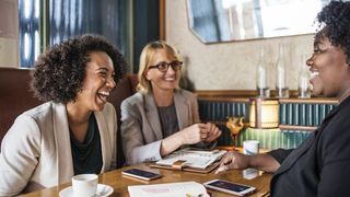 People at a table business networking.