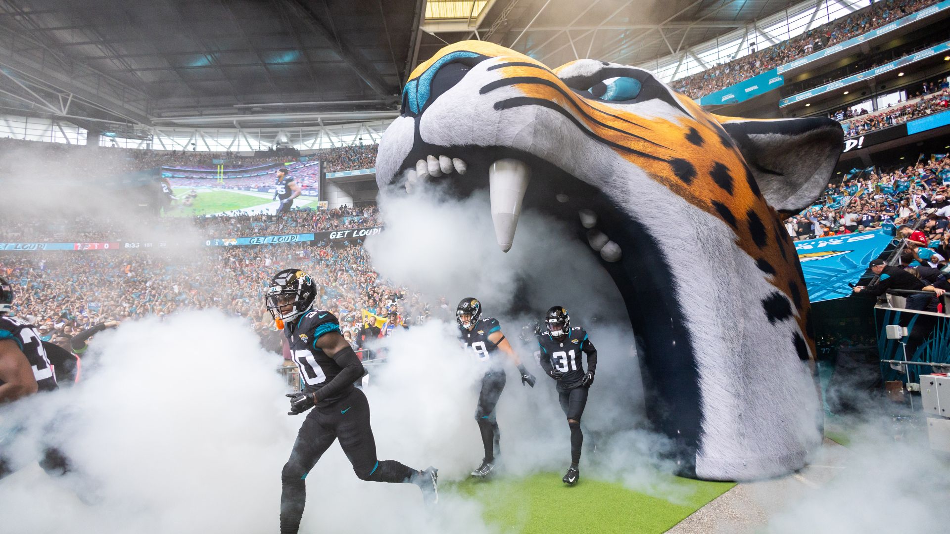 Jacksonville Jaguars cornerback Montaric Brown (30) leads the team onto the field before the NFL international series game between the Jacksonville Jaguars and Atlanta Falcons at Wembley Stadium in London, United Kingdom
