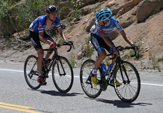 Tom Danielson (Garmin) checks on Tejay van Garderen (BMC)
