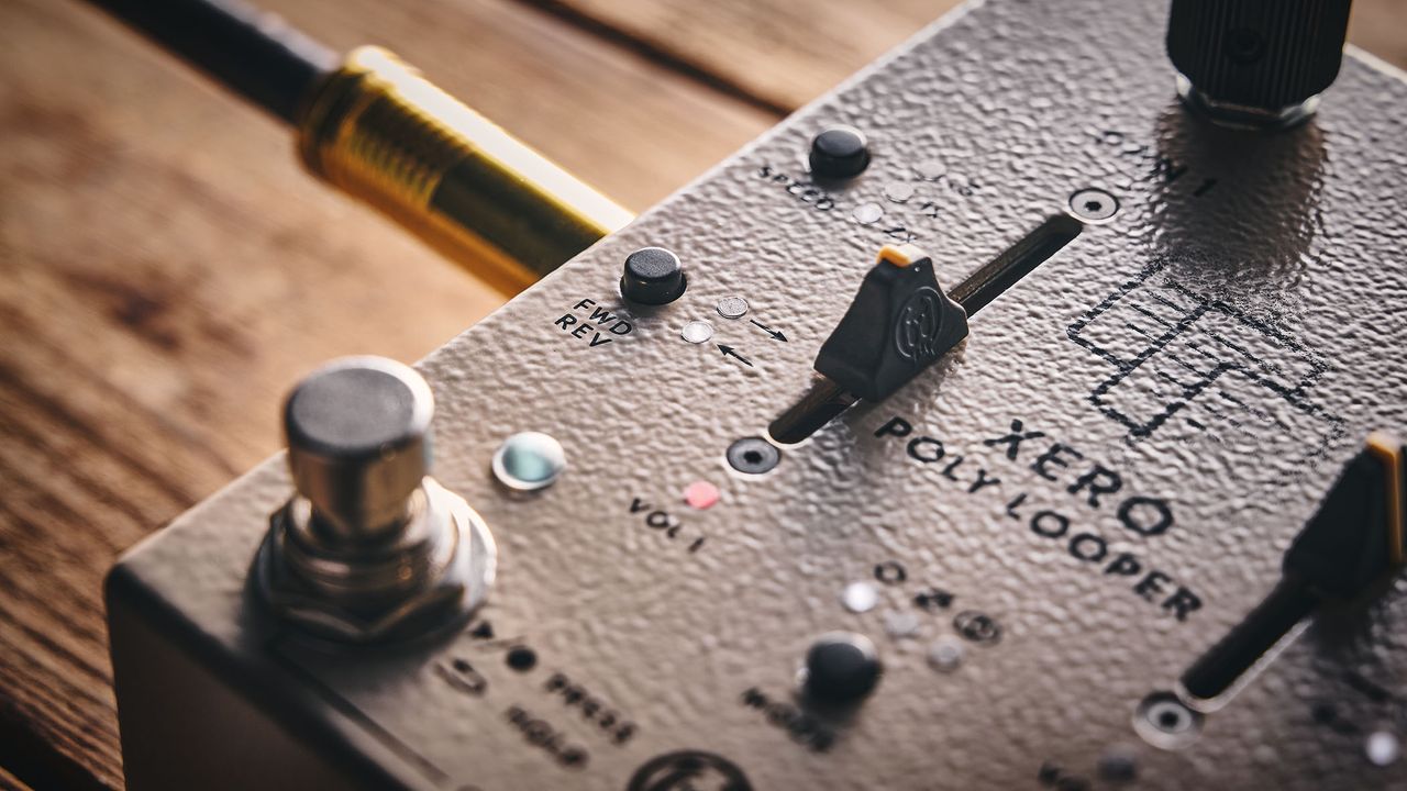 Walrus Audio Xero Polylooper: the dual-slider and footswitch looper is photogaphed against a wooden floor.