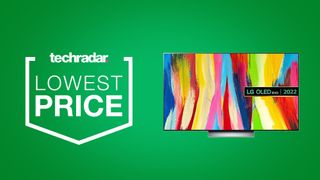 LG C2 OLED TV on a green background next to techradar deals lowest price badge