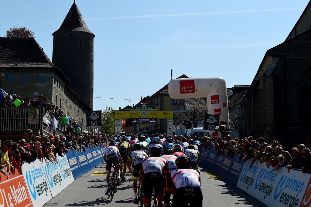 ROMONT SWITZERLAND APRIL 27 A general view of the peloton competing in Romont city during the 75th Tour De Romandie 2022 Stage 1 a 178km stage from La Grande Beroche to Romont 777m TDR2022 on April 27 2022 in Romont Switzerland Photo by Dario BelingheriGetty Images