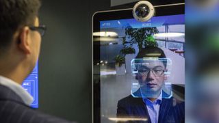 Xu Li, CEO of SenseTime Group Ltd., is identified by the A.I. company&#039;s facial recognition system at the company’s showroom in Beijing, China, on June 15, 2018.