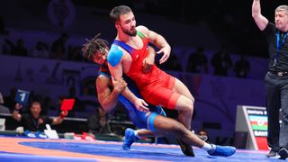 Turan Bayramov and Frank Chamiz Marquez in a qualifying wrestle for the 2024 Olympic games.