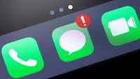 iPhone screen focused on iMessage icon