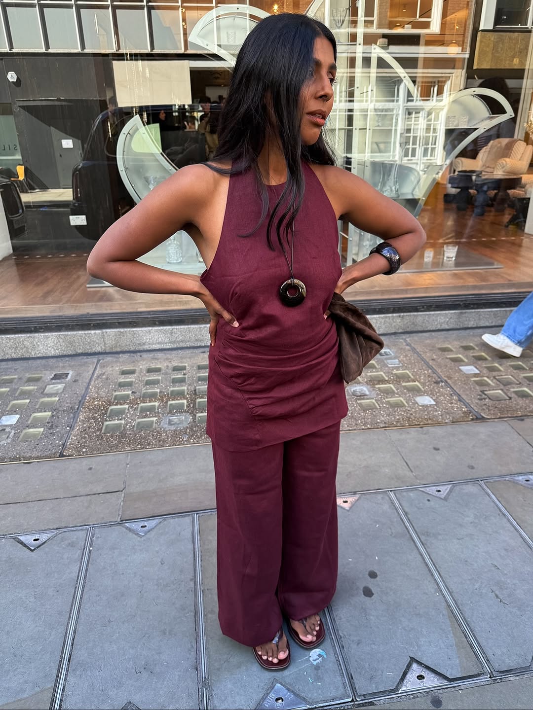 woman wearing brown maroon color trend fall 2025
