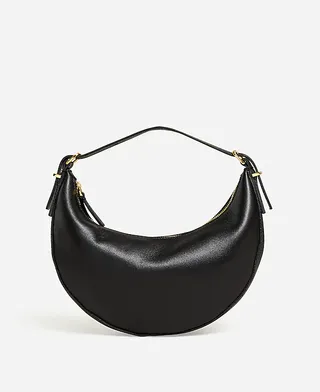 Madewell, a mini bolsa crossbody conversível essencial com alça superior