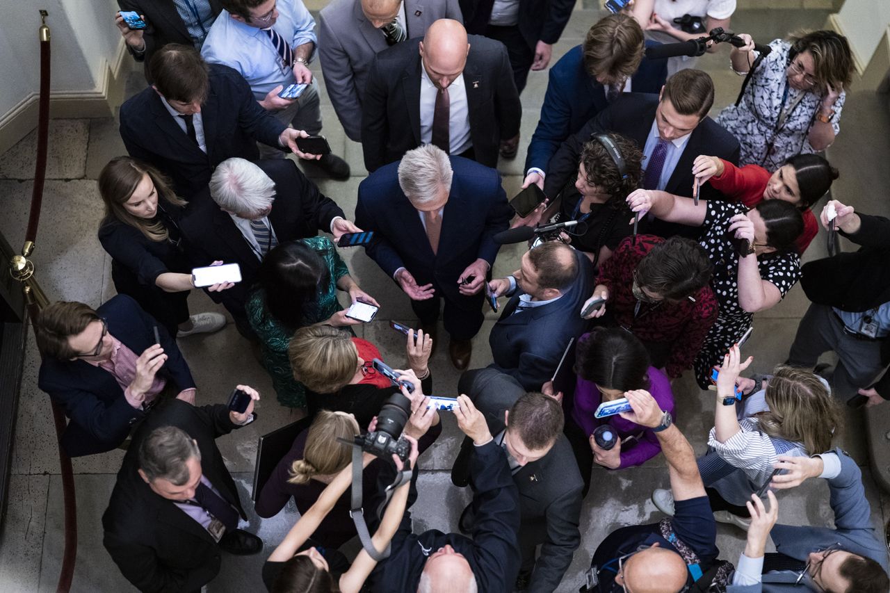  Kevin McCarthy surrounded by reporters