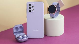 Samsung Galaxy A52 in violet with Galaxy Buds and Galaxy Watch 3