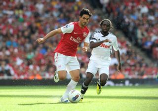 Mikel Arteta in action for Arsenal against Swansea City in 2011.