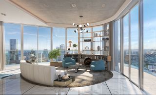 Curved seating area with blue chairs, white sofa and view of the city from glass windows