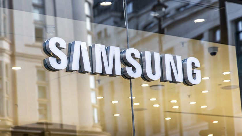 Samsung&#039;s tech brand lettering logo on a glass window.