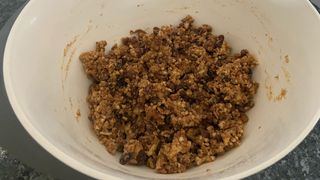 a homemade christmas pudding mix in a mixing bowl