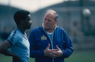 England manager Ron Greenwood (1921 - 2006) with one of the team's strikers, Laurie Cunningham, April 1980. (Photo by Duncan Raban/Hulton Archive/Getty Images)