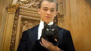 Titanic cat trailer showing Leonard DiCaprio holding black cat