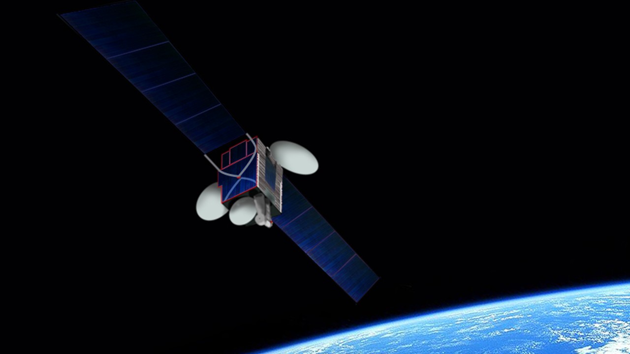 a cube-shaped satellite with several radar dishes on it