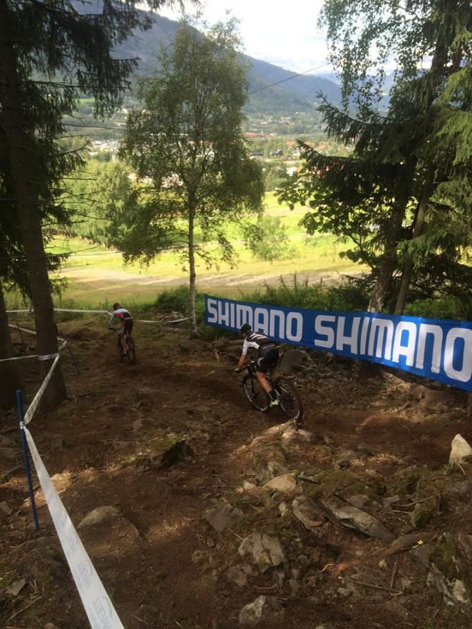 Anton Cooper speeds effortlessly through a technical downhill