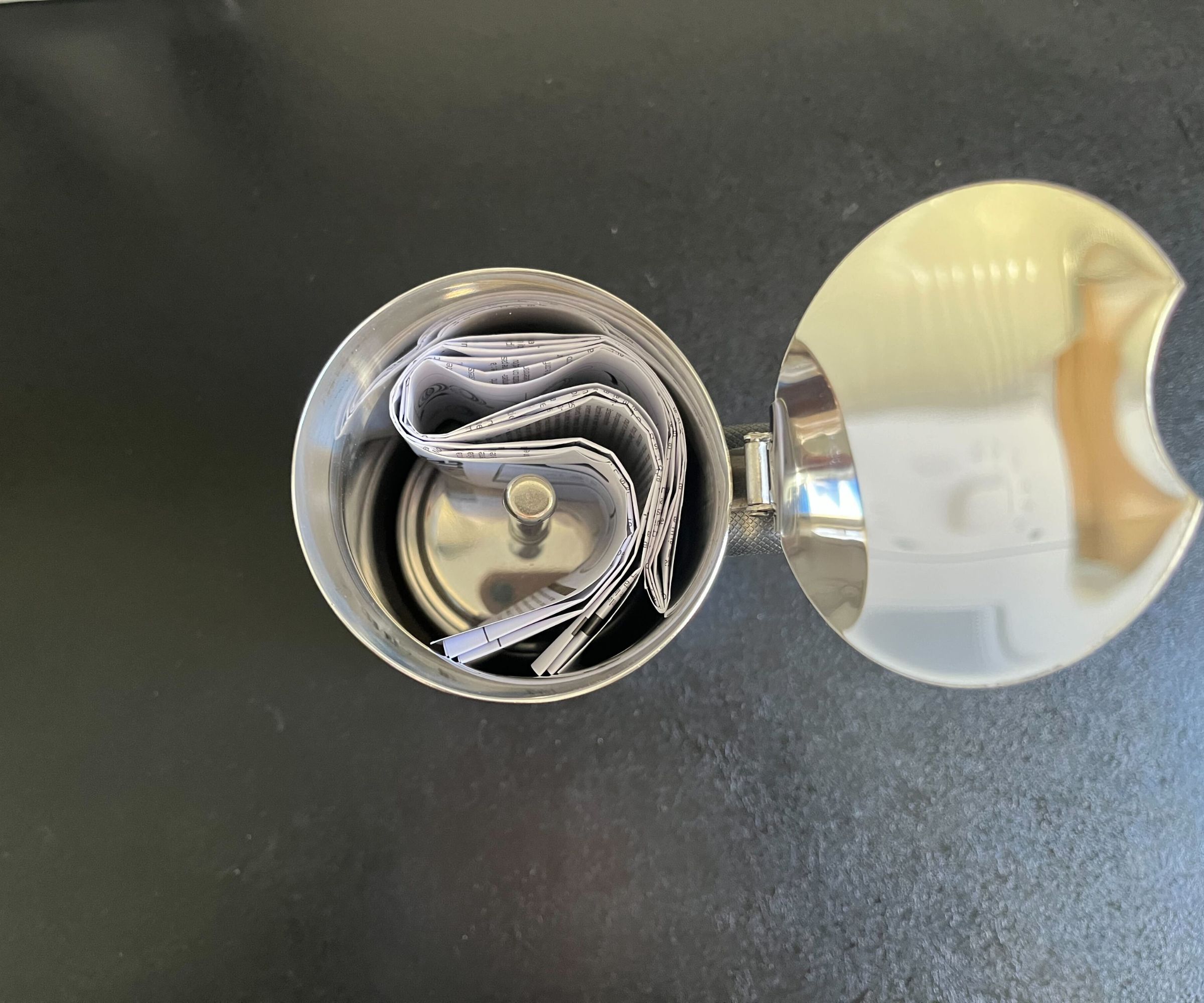 The folded instruction manual inside the stainless steel Bialetti Venus