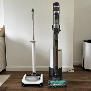 Gtech AirRAM Platinum and Shark PowerDetect Clean and Empty cordless vacuums side by side