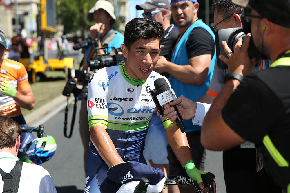 Caleb Ewan conducts his TV interview after winning