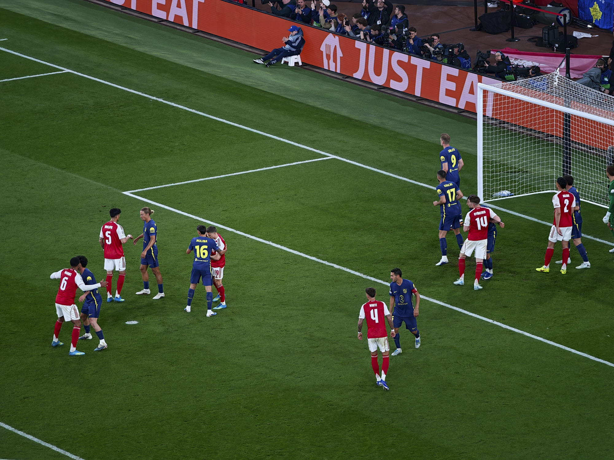 Action photos during a Champions League soccer match at Arsenal's Emirates stadium, taken with the Oppo Find X9 Ultra and teleconverter lens