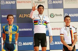 Fabian Cancellara (Switzerland) counts his world time trial championships.