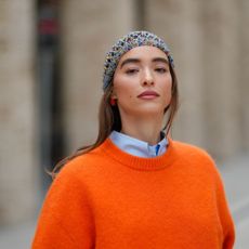 a close-up of a woman with bright undereyes - caffeine eye cream