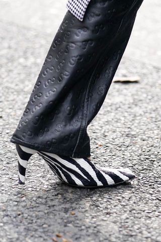 Photo of zebra heel pump boot on the street