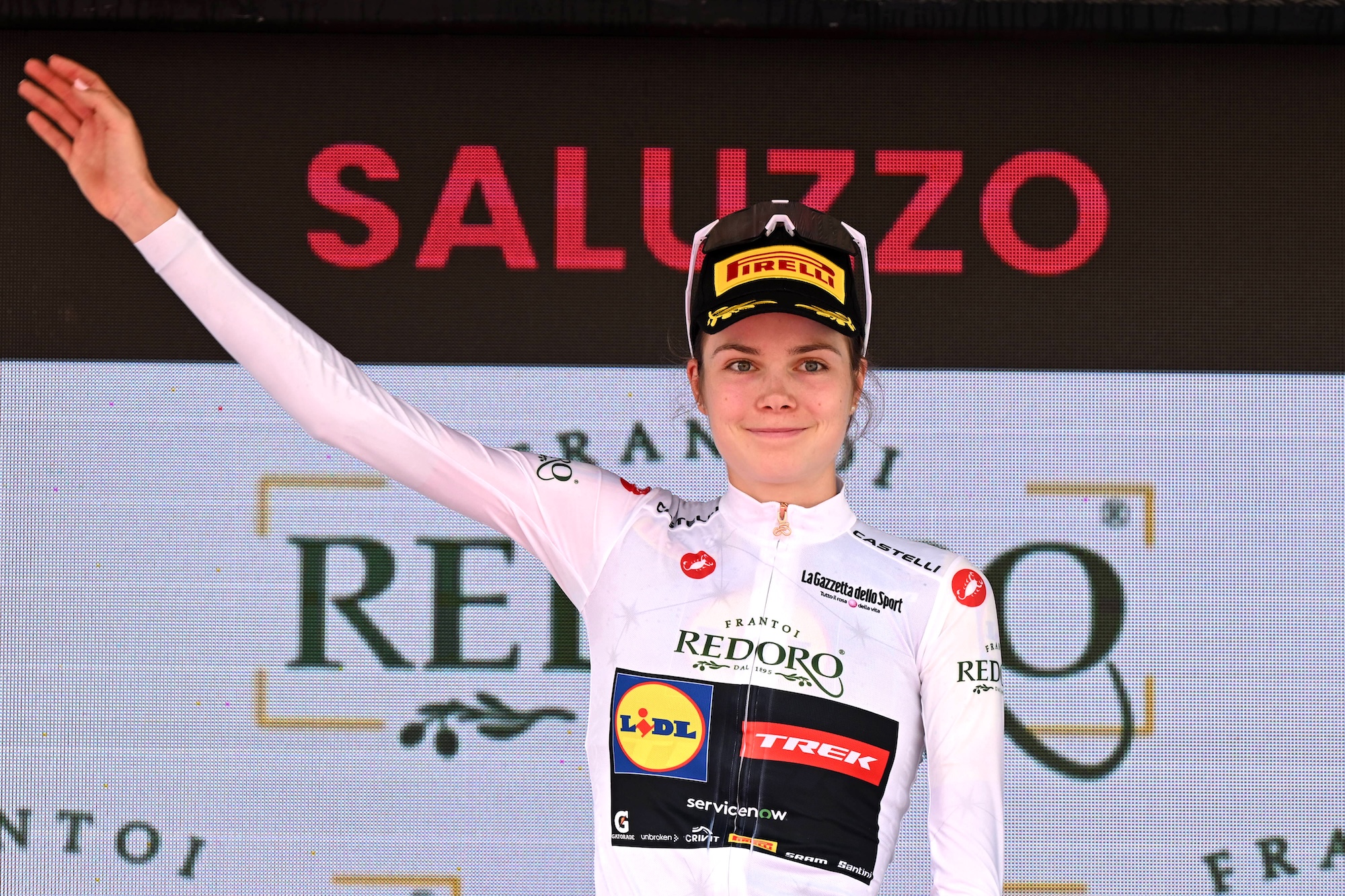 Isabella Holmgren of Canada (Lidl - Trek) celebrates at podium as White Best Young Rider Jersey winner the 2026 Giro d'Italia Women