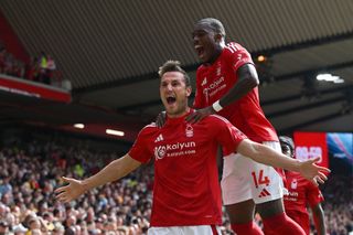 NOTTINGHAM, ENGLAND - AUGUST 31: Chris Wood of Nottingham Forest celebrates scoring his team's first goal with team mate Callum Hudson-Odoi during the Premier League match between Nottingham Forest FC and Wolverhampton Wanderers FC at City Ground on August 31, 2024 in Nottingham, England. (Photo by Shaun Botterill/Getty Images)