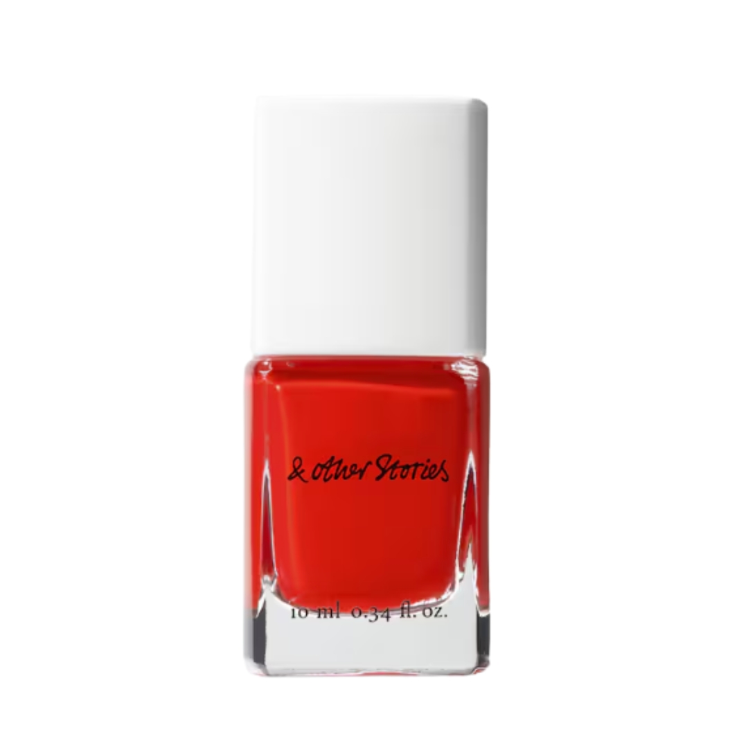 A product shot of the &amp;amp;OtherStories Bright Tomato Nail Colour, on a white background