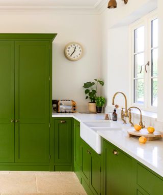 Traditional shaker kitchen painted in Jewel Beetle by Little Greene