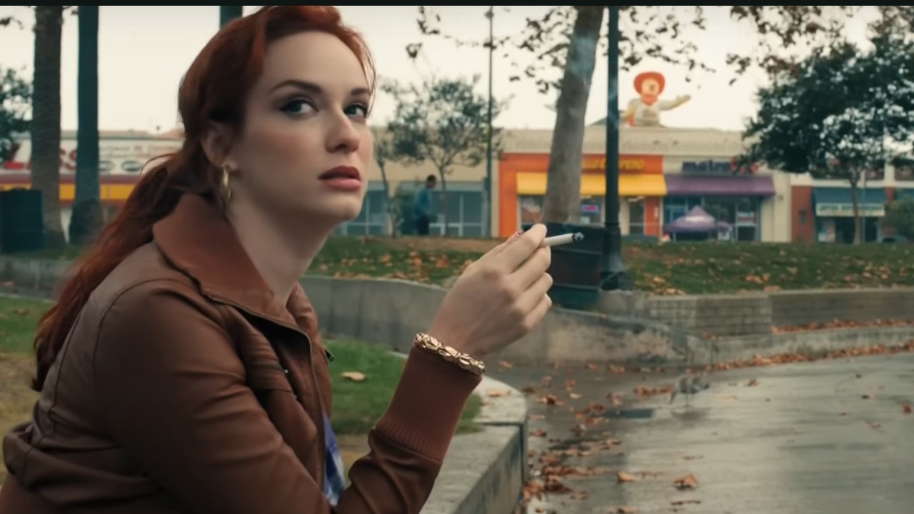 Christina Hendricks smoking a cigarette in Drive
