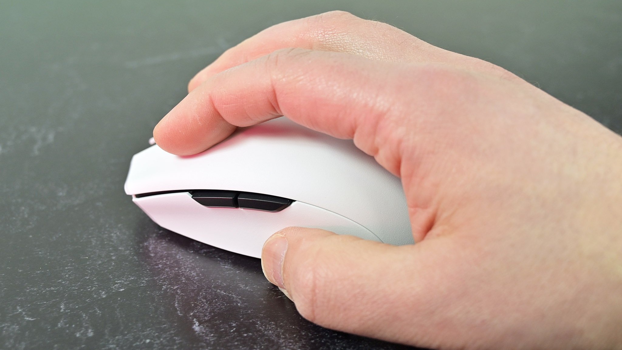 Photograph of the Razer Orochi V2 gaming mouse being used.