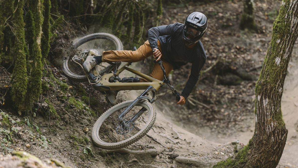 Specialized Turbo Kenevo SL2 being jumped on a gnarly trail