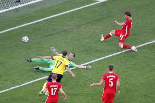 Viktor Claesson scores the winner for Sweden against Poland to ensure they topped Group E