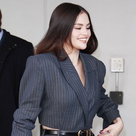 Selena Gomez wears a cropped blazer and matching trousers while attending the Drew Barrymore show in New York City