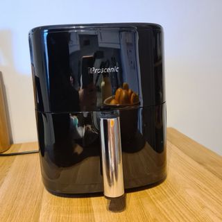 Proscenic T22 Air Fryer on a wooden table