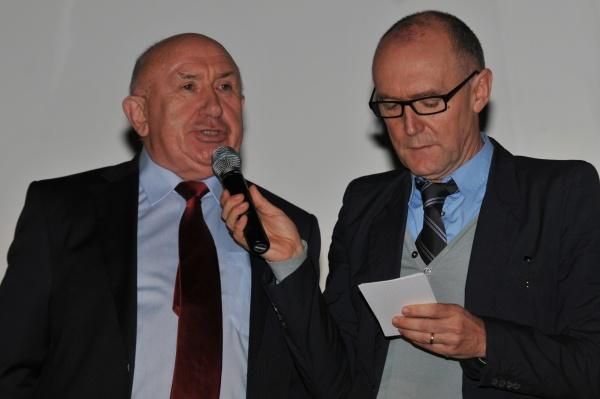 The team's manager Hilaire van der Schueren has some mic time