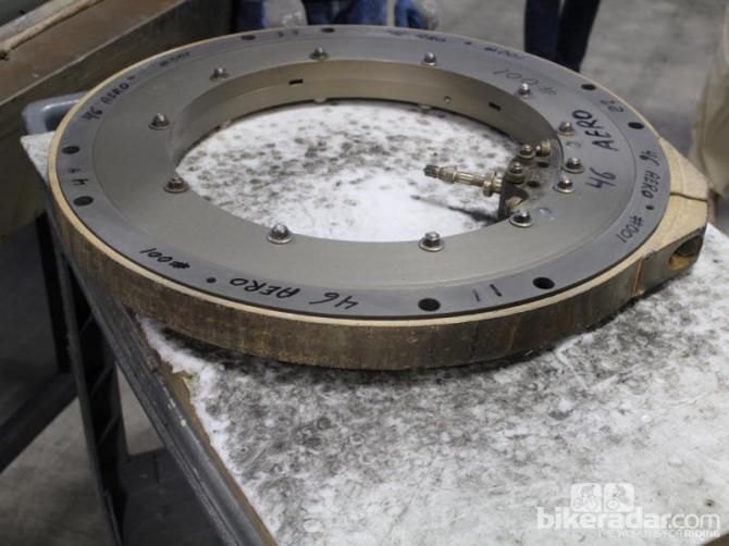 We weren't allowed to see the layup process, but once the carbon is laid on the mold the whole operation is bolted together in this shell