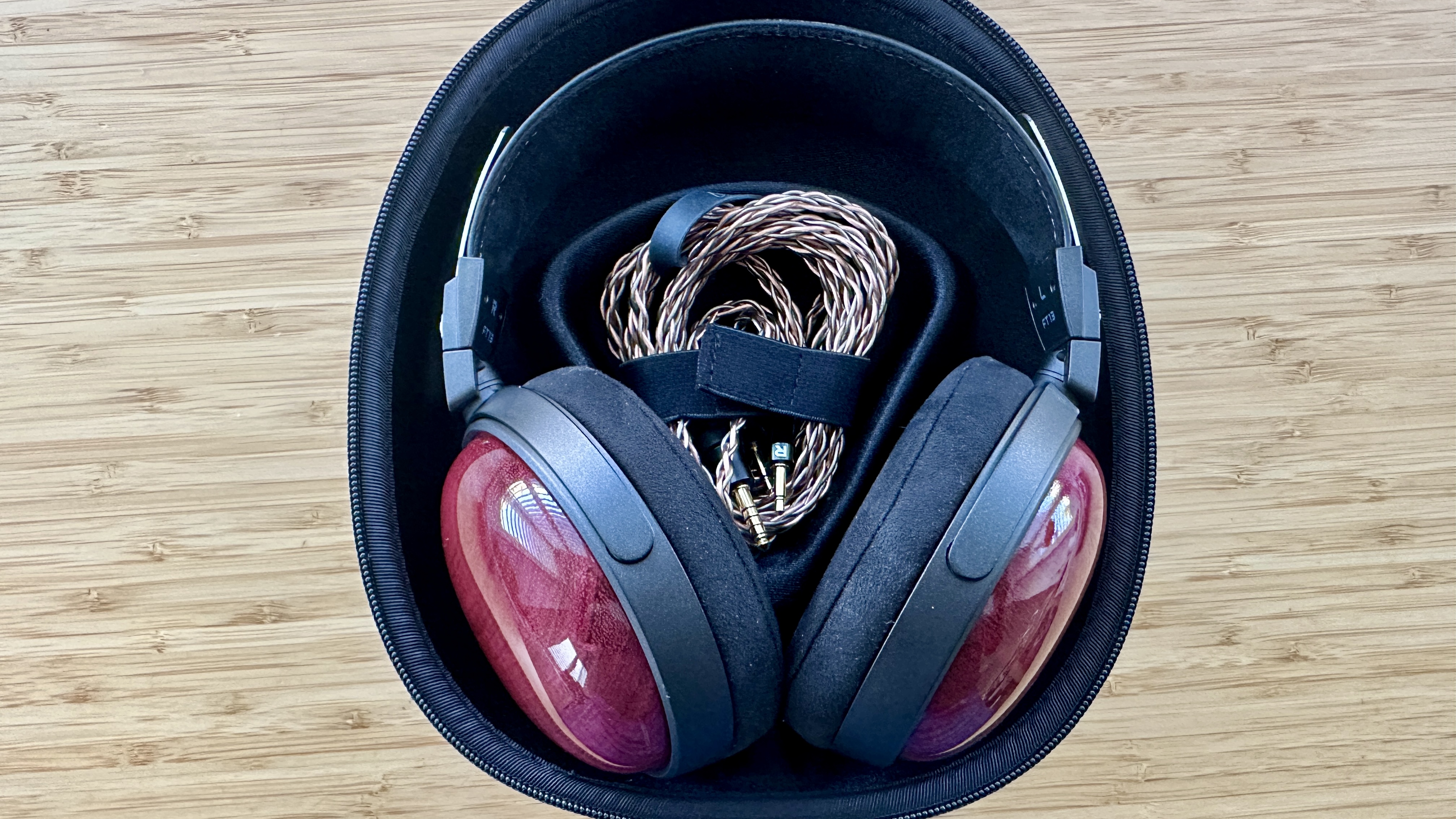 FiiO FT13 closed-back over-ear wired headphones in their own hard carry case.