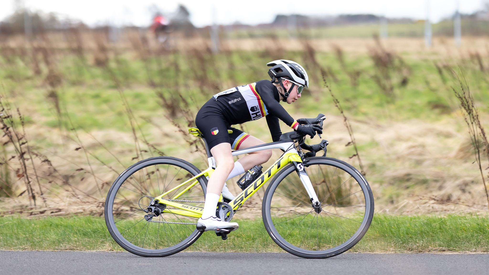 A boy riding a Scott bike during child's bike race