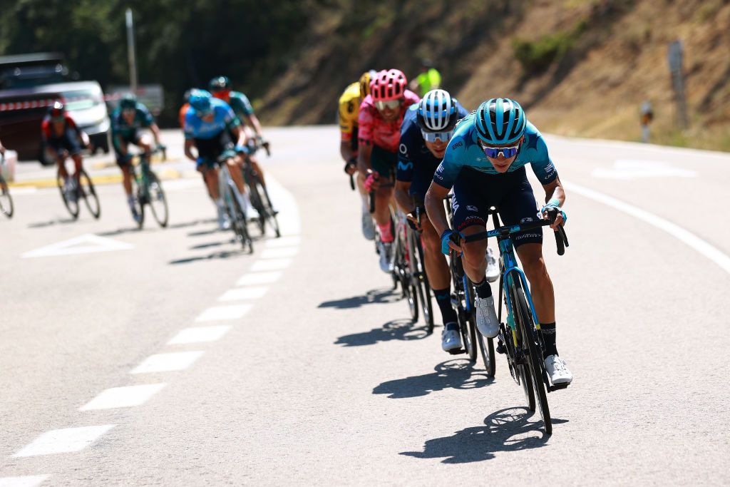 VILLARCAYO SPAIN AUGUST 04 Vadim Pronskiy of Kazahkstan and Team Astana Qazaqstan leads the peloton during the 44th Vuelta a Burgos 2022 Stage 3 a 156km stage from Quintana Martn Galndez to Villarcayo on August 04 2022 in Villarcayo Spain Photo by Gonzalo Arroyo MorenoGetty Images