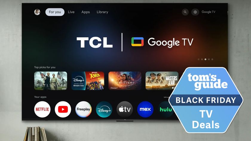 TCL Q5 98-inch TV on wall