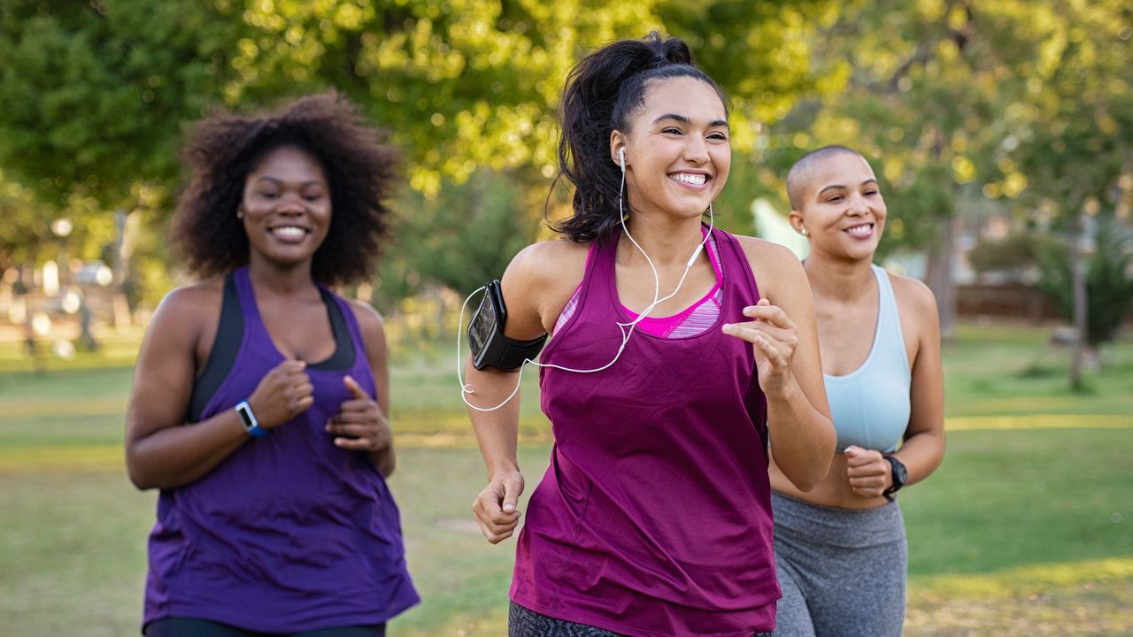 Women running together in a park