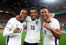 Ezri Konsa, Jude Bellingham and Ollie Watkins of England celebrate following the UEFA EURO 2024 semi-final match between Netherlands and England