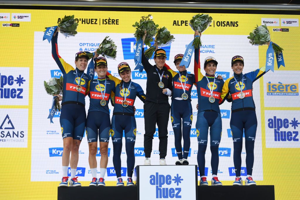 ALPE DHUEZ FRANCE AUGUST 18 Gaia Realini of Italy Elisa Balsamo of Italy Lucinda Brand of The Netherlands Elizabeth Deignan of The United Kingdom Amanda Spratt of Australia Shirin Van Anrooij of The Netherlands Ellen Van Dijk of The Netherlands and Team Lidl Trek celebrate at podium as best team prize winners during the 3rd Tour de France Femmes 2024 Stage 8 a 1499km stage from Le GrandBornand to Alpe dHuez 1828m UCIWWT on August 18 2024 in Alpe dHuez France Photo by Alex BroadwayGetty Images