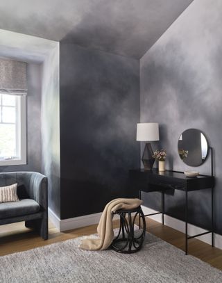 A bedroom with textured paint on walls and ceiling