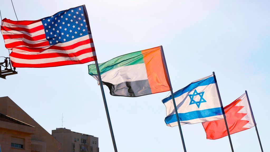 U.S., UAE, Israel, Bahrain flags.